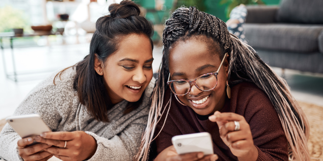 Image of Girls Looking at their Phones