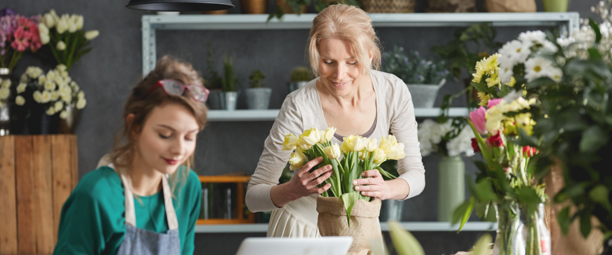 Two Small Business Owners Following Cash Flow Management Tips For Their Seasonal Company