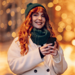 Image Of A Woman Holding Her Phone and Looking at the Rates On The Northwest Bank Website