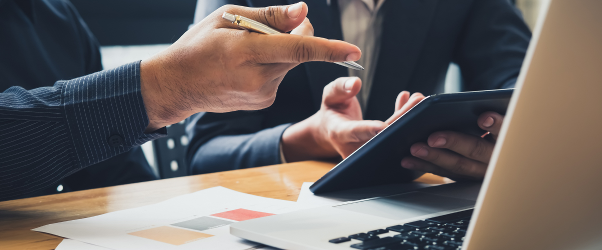 A small business owner using a treasury management system to reduce fraud