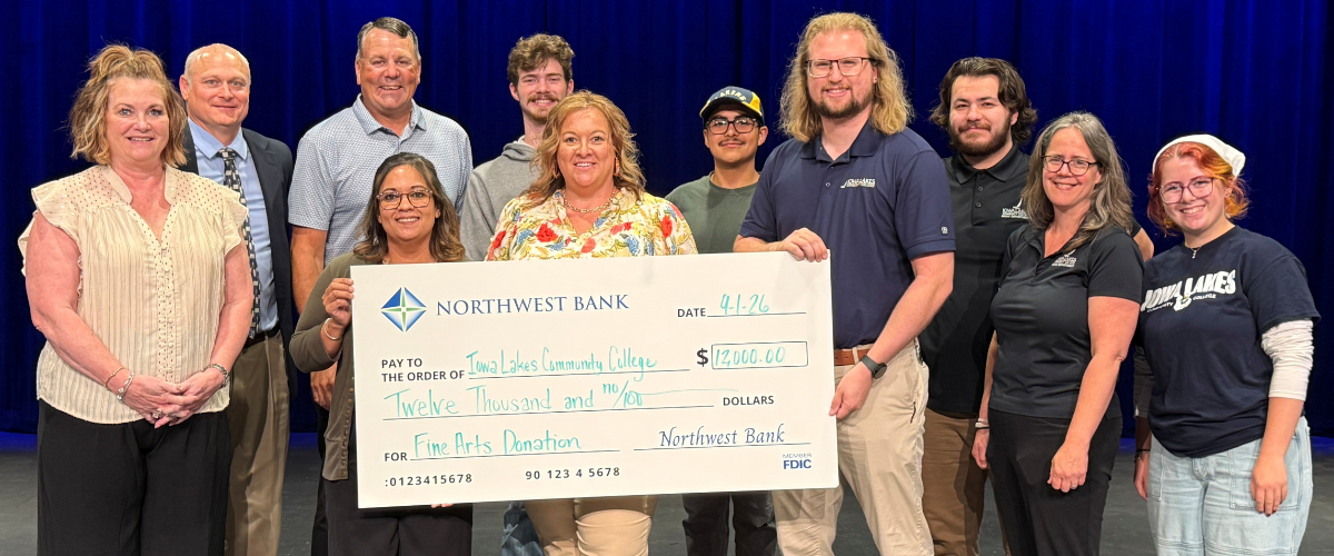 Marcy Sander, Yas Mata, Barb Houseman, and Eric Walhof of Northwest Bank presented the check to Lincoln Larsen, Scott Stokes, and Jessi Strom of Iowa Lakes Community College, along with ILCC Fine Arts students.