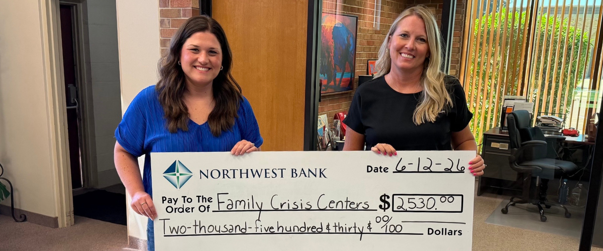 Nicole Evans, Northwest Bank Lakes Market President presents a donation to Jessica Rohrs, Executive Director of Family Crisis Centers in the amount of $2,530.00.