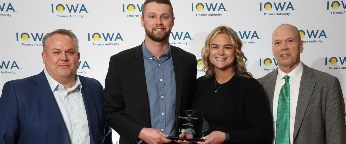 Image of Northwest Bank Staff Holding the Iowa Finance Authority Award