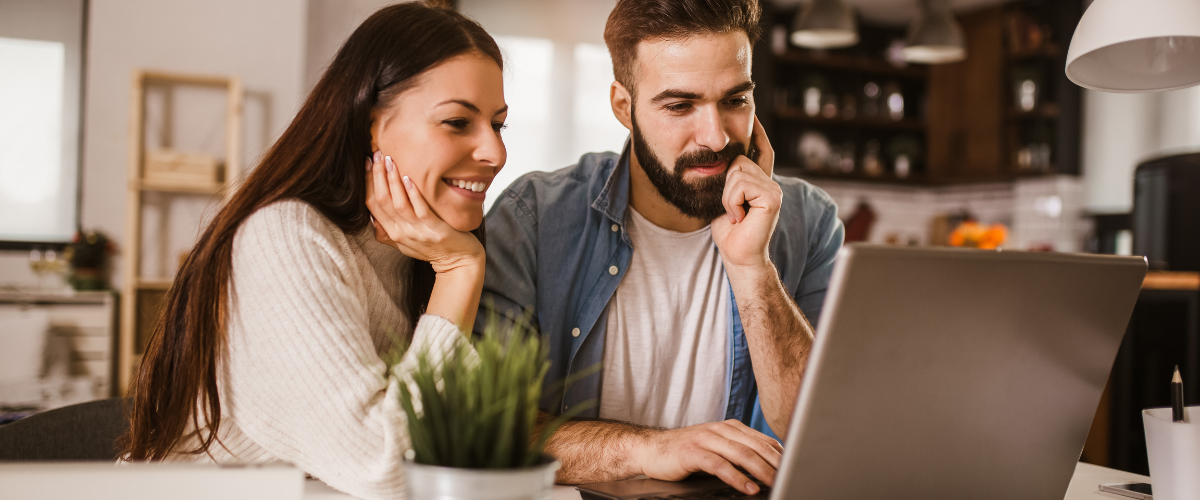 Image of Couple Reading Our Simple Ways to Build Wealth Over Time Article