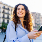 Image of a Woman Smiling Because She Opened an Unlimited Additions CD with Northwest Bank!