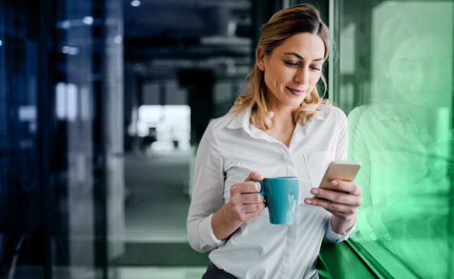 Woman Using Her Phone To Bank Online