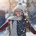 Image of Girl Throwing Snow In The Air Excited Because Northwest Bank has Special CD Offers!