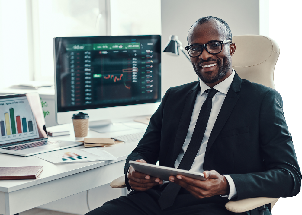 Man in chair in front of laptop
