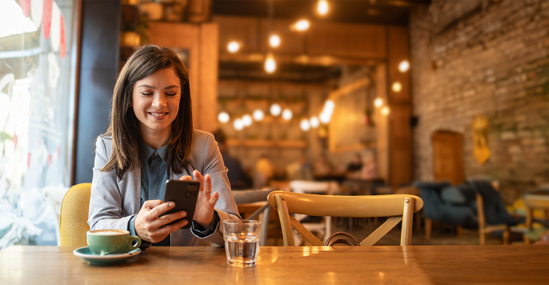 Woman in coffee shop on phone