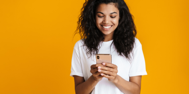 Woman Looking At Her Phone